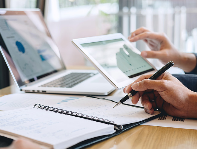 People are working on their laptops.