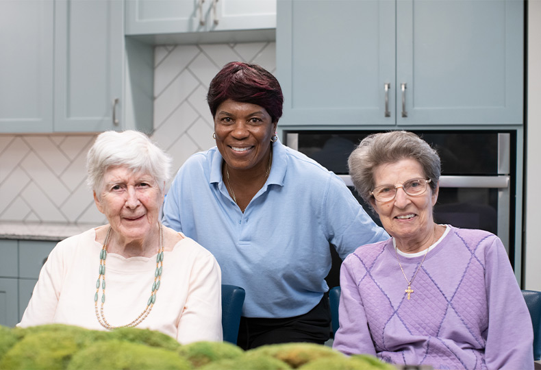 A group of people smiling.