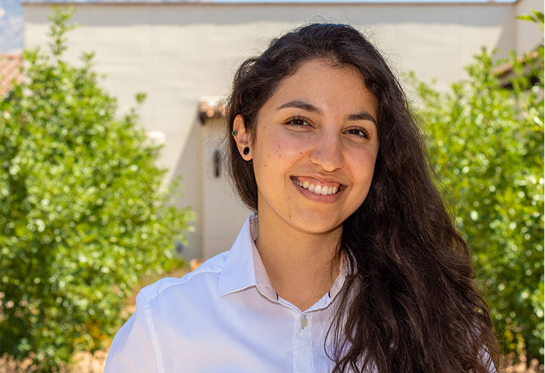 A person outside smiling.