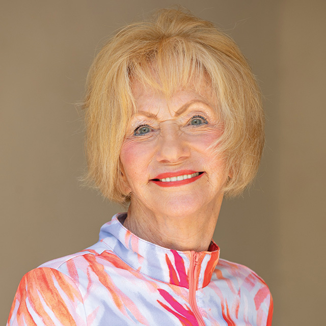 A headshot of a blonde, smiling female resident.