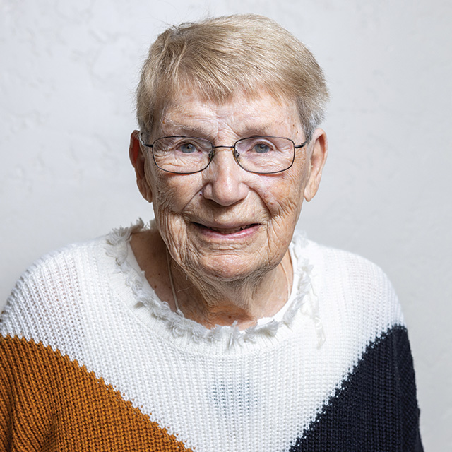 A headshot of a blonde, smiling female resident.