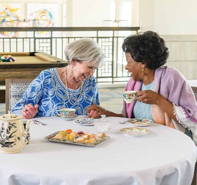 Two people having tea.