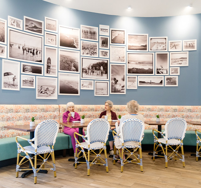 People sitting in a cafe having coffee.