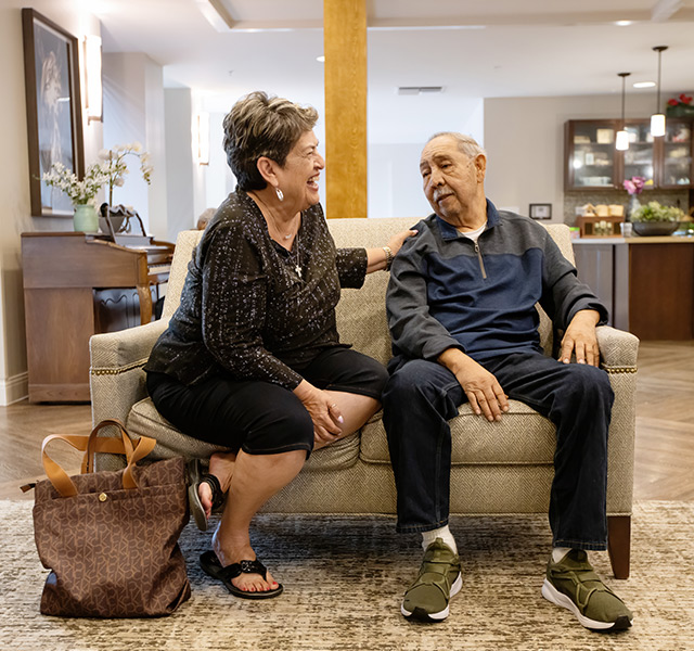 A wife talking to her husband who is a resident.