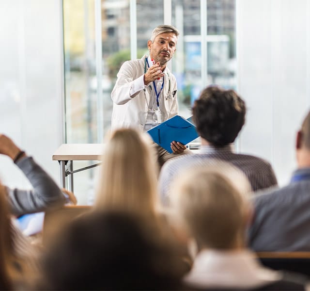 A professor at UCLA is teaching a class.