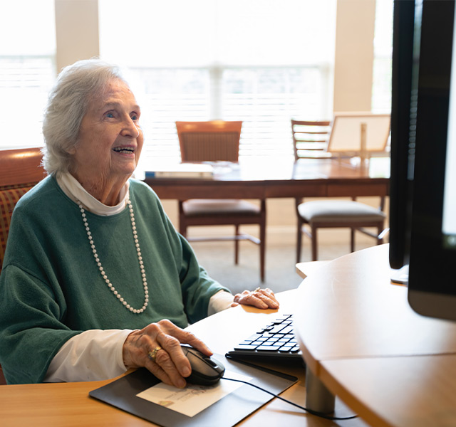 A person on the computer.