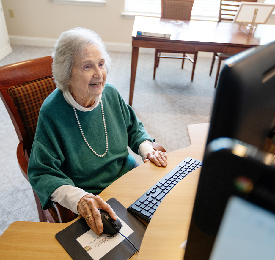 A person on the computer.