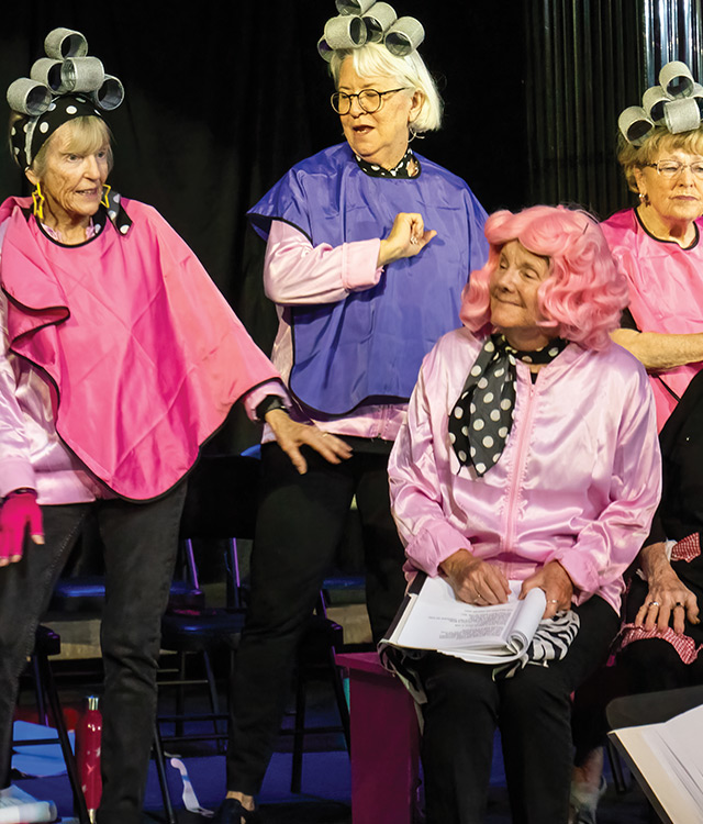 People dressed up in a play.