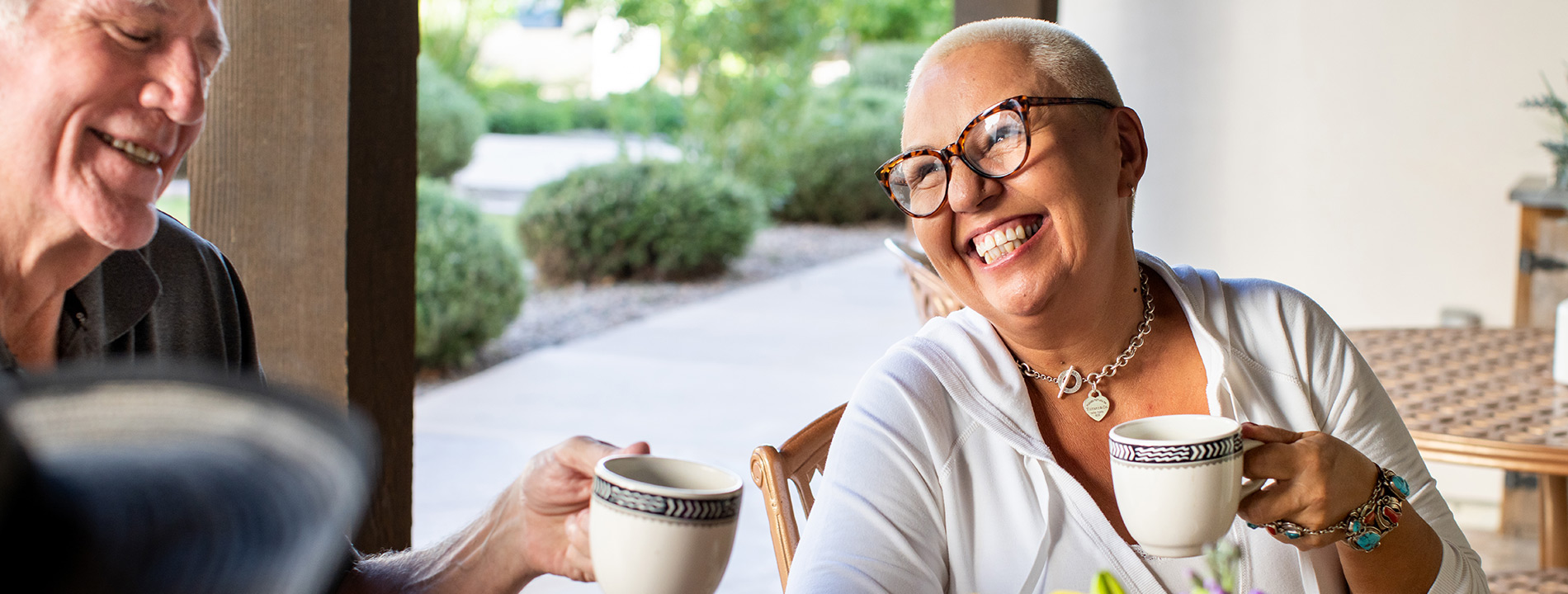 Two people having coffee.