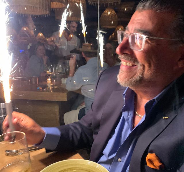 Chef Vazquez holding sparkler