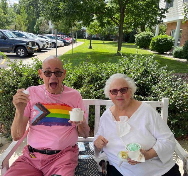 Two residents enjoying ice cream.