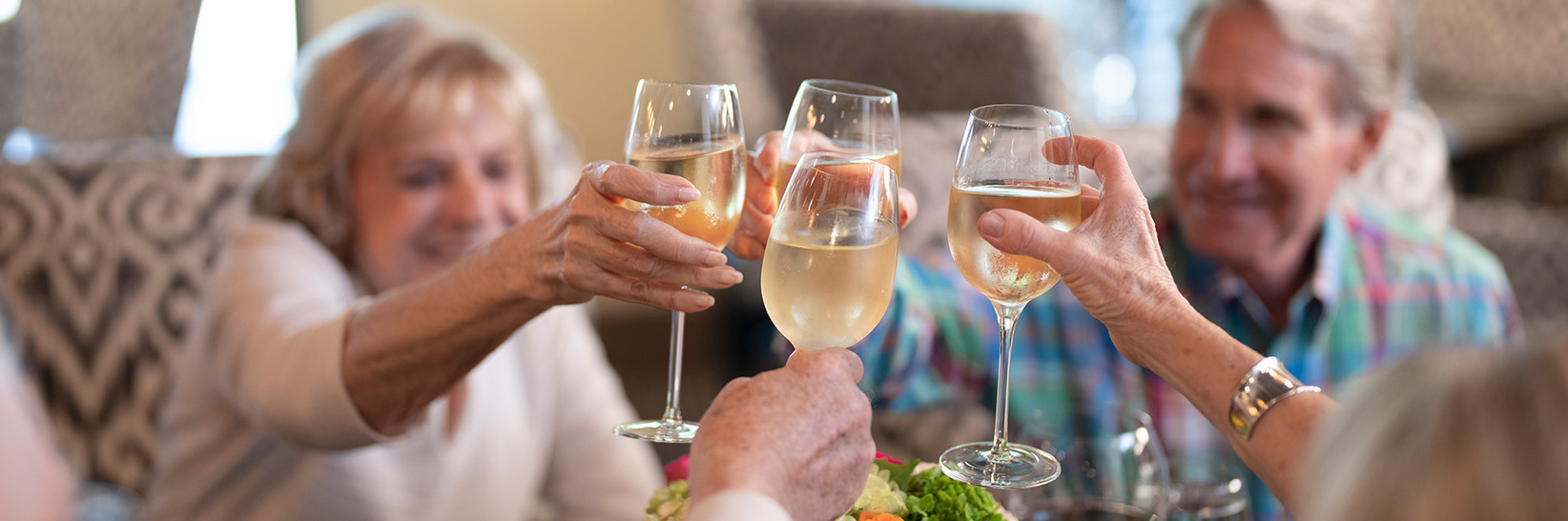 Residents enjoy lunch and drinks. Residents enjoy lunch and drinks.