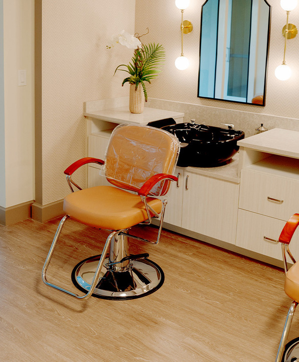 Accordion image Chairs in a salon.