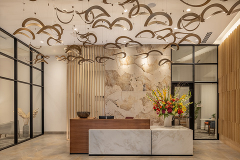 A lobby with a front desk.