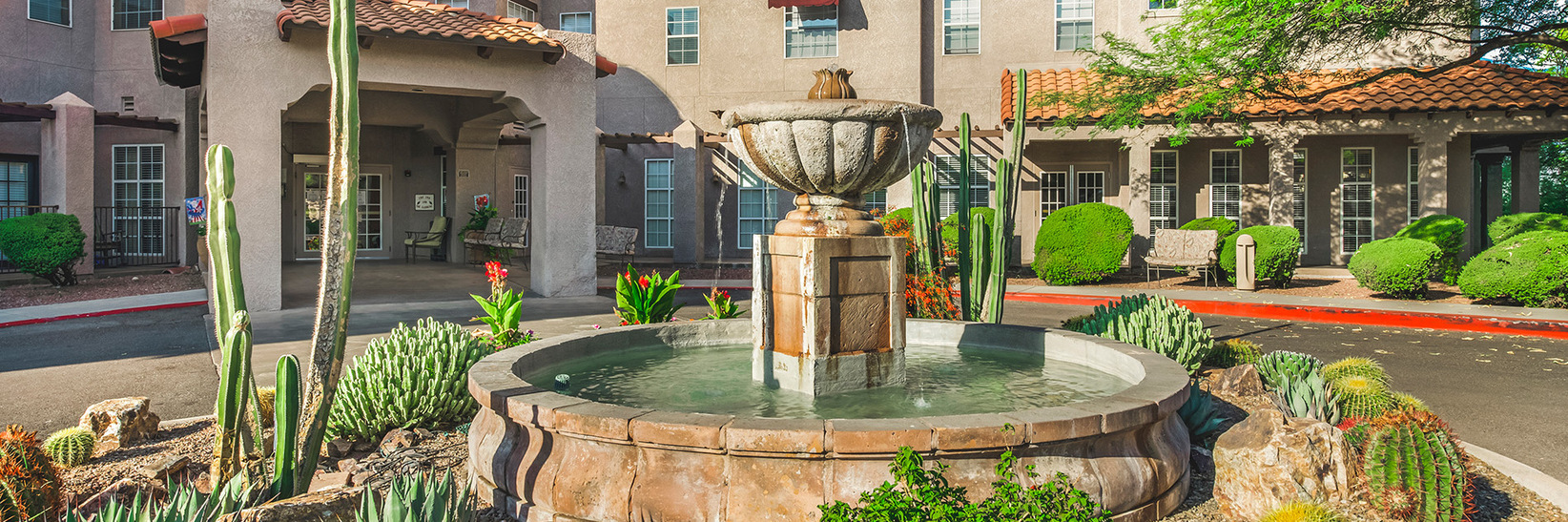 The front exterior entrance for The Fountains at La Cholla.