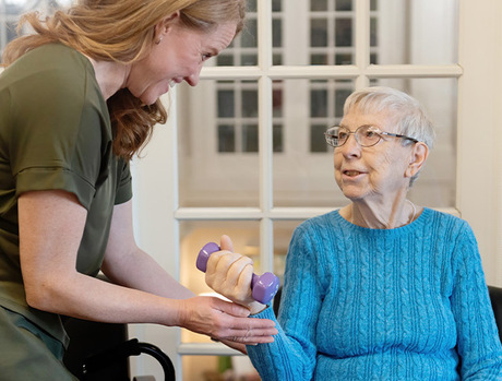 A person working with a physical therapist.