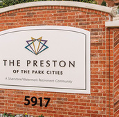 The exterior brick sign of The Preston.