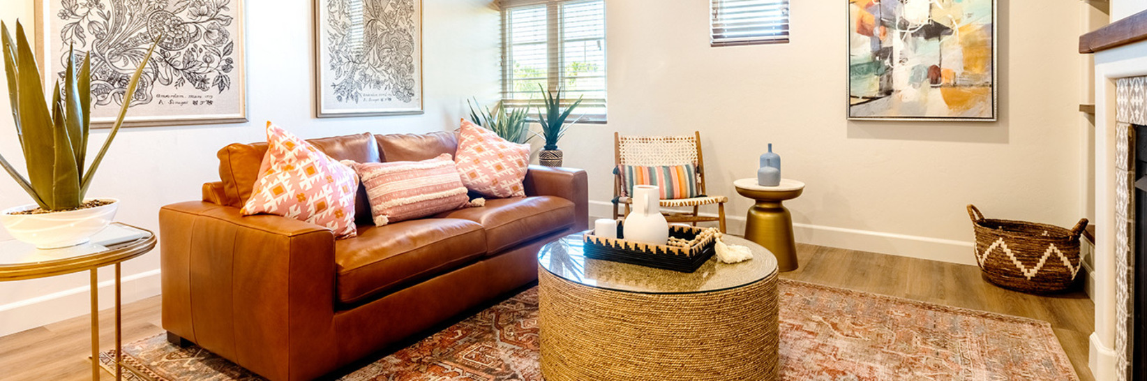 Fully furnished living room with couch and ottoman. Fully furnished living room with couch and ottoman.