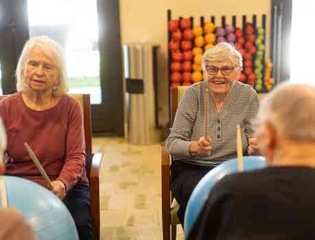 Members in a drum fitness class.
