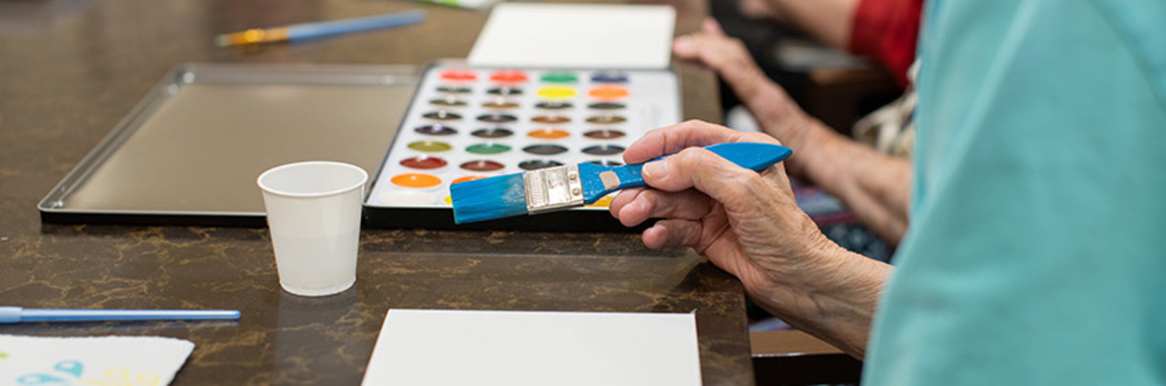 People painting pictures. People painting pictures.