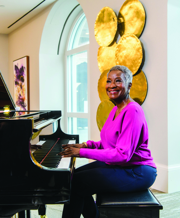 Resident playing piano. Resident playing piano.