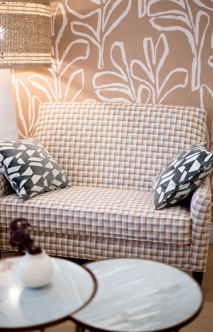 A couch with pillows.