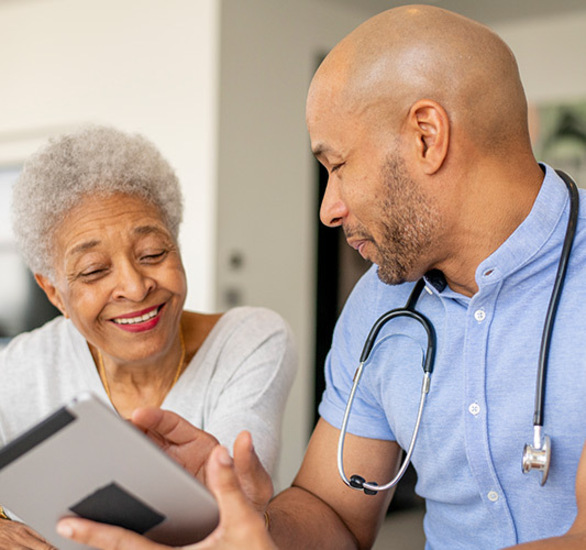 A resident with their nurse.