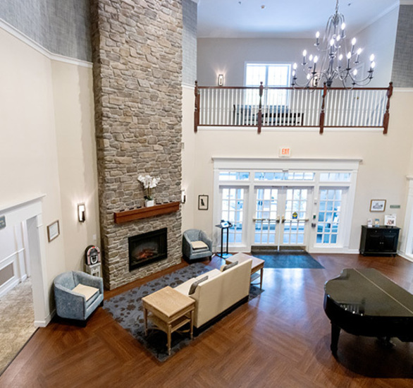 The lobby with a front desk and seating.