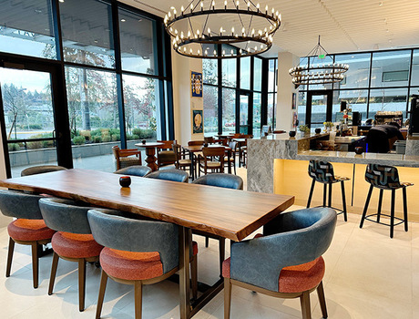 A cafe with tables and seating.