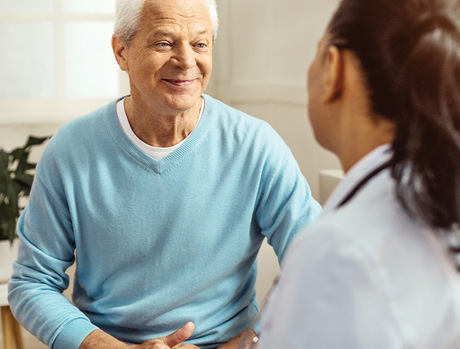 A person talking with a doctor.