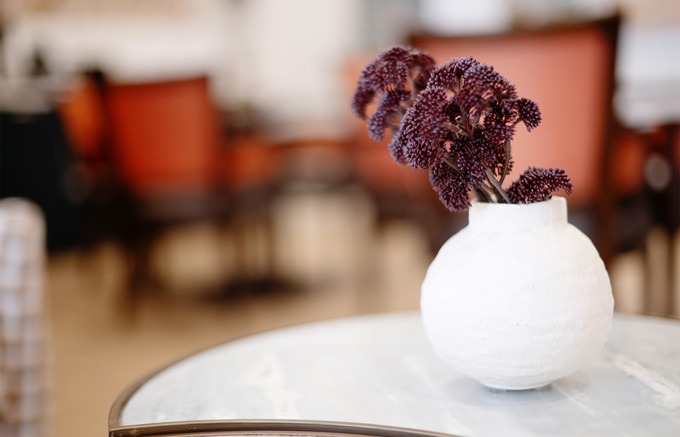 A vase on a table.