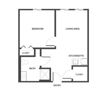 An assisted living suite floor plan with two bedrooms and a bathroom.