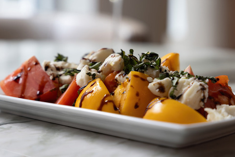 A caprese salad on a plate.