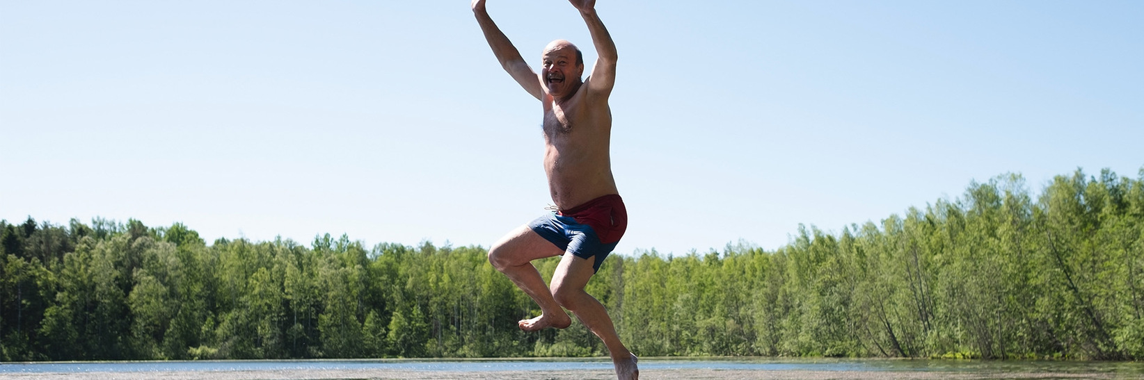 A resident dives into the water. A resident dives into the water.