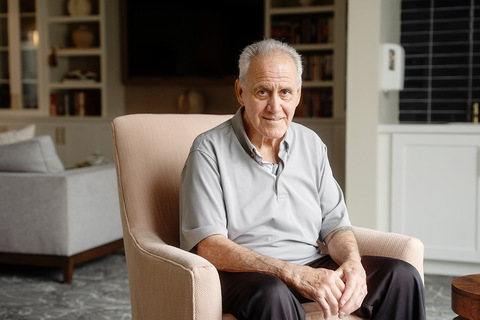 A person sitting in a chair.