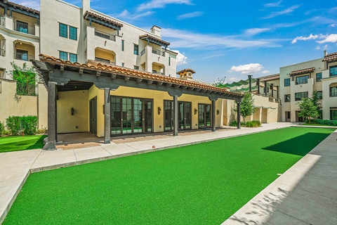 The Hacienda at the Canyon exterior building with golf field.