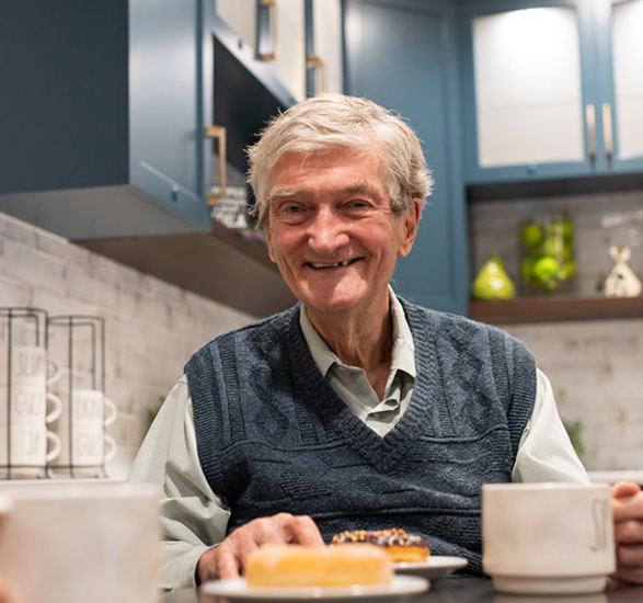 A person having coffee.