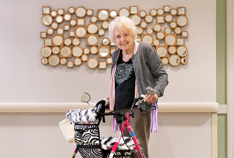 A resident and their decorated walker.