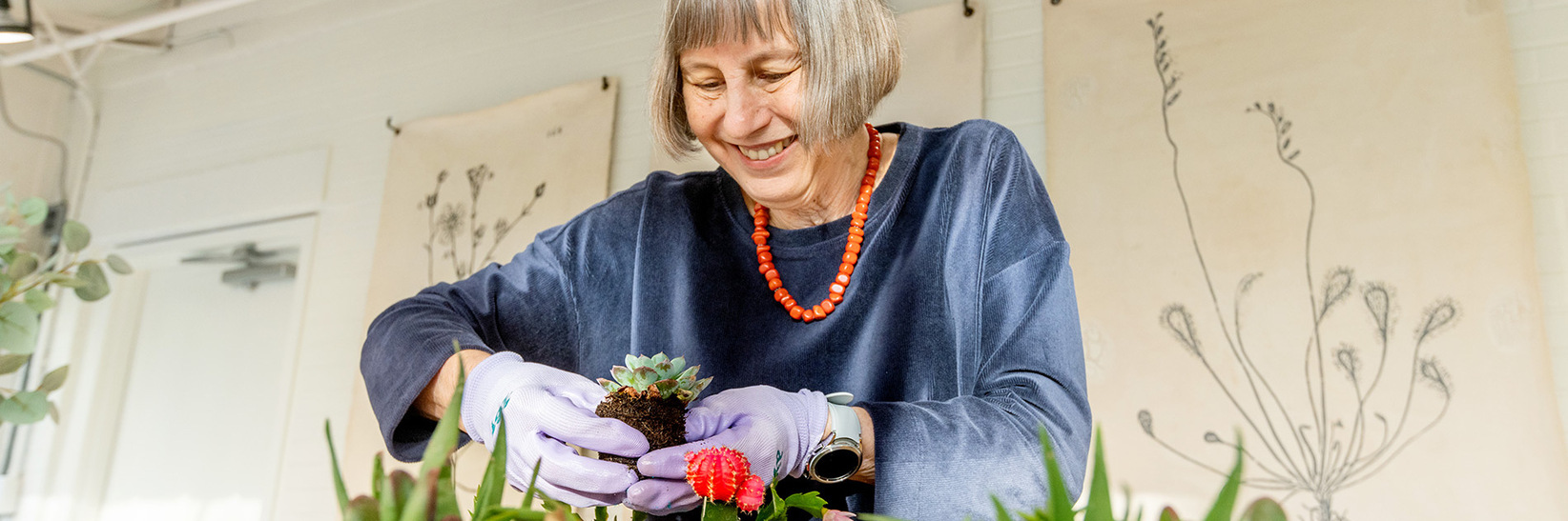 A resident is gardening. A resident is gardening.