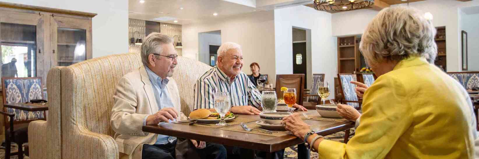 Members of The Hacienda at the River eating a meal in the Acacia restaurant. Members of The Hacienda at the River eating a meal in the Acacia restaurant.