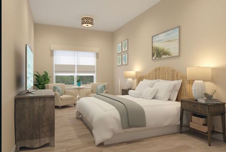 Studio apartment with a window, bed, dresser and side table.