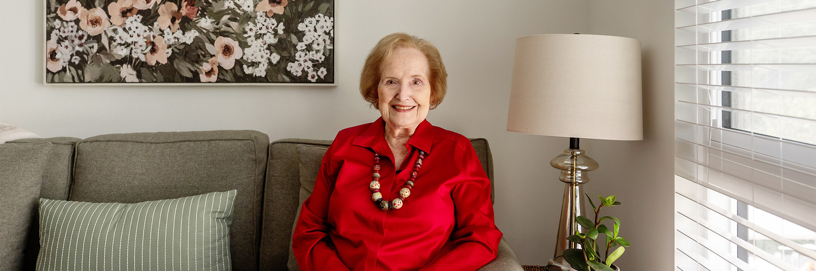 A person sitting on the couch at Watermark Laguna Niguel assisted living community. A person sitting on the couch at Watermark Laguna Niguel assisted living community.