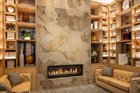 A seating area with a fireplace.