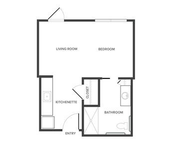 An assisted living studio suite floor plan with an open living/bedroom space and kitchenette.