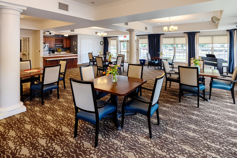 A dining room set for dinner.
