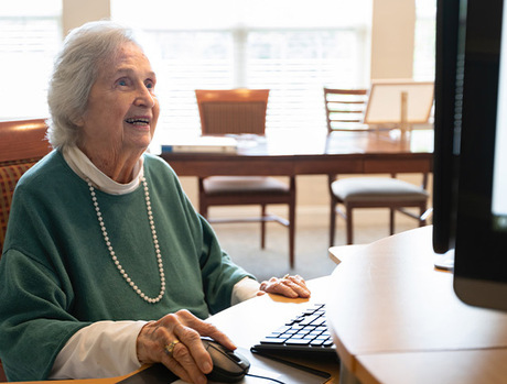 A person on the computer.