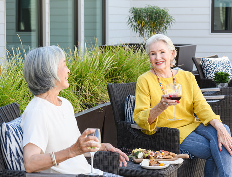 People having drinks on the patio.