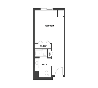 A memory care studio suite floor plan with an open living/bedroom space.