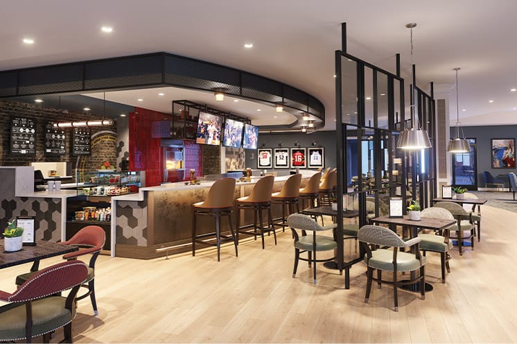 A bar with tables and chairs.