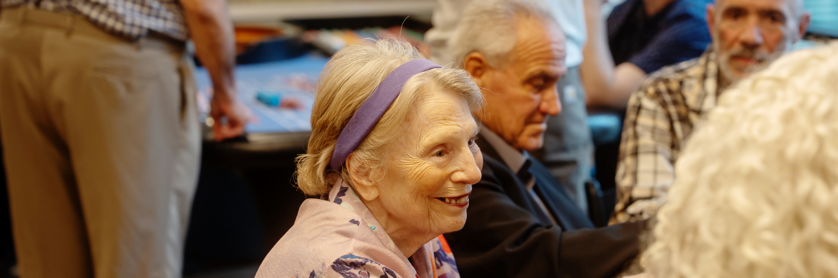 Residents playing poker at the community. Residents playing poker at the community.
